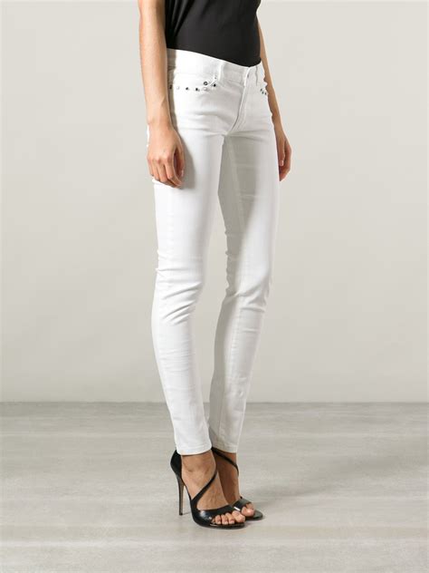 michael kors white rn jeans.